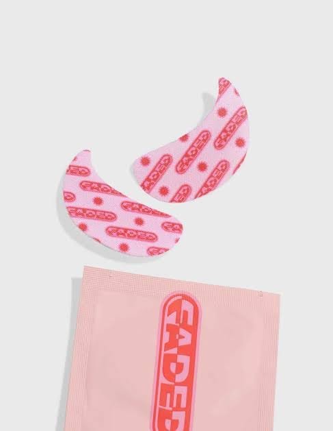 Faded Topicals Under Eye Masks 1 pair in pink and white packaging on white background. Brightening under-eye patches for dark circles and puffiness.