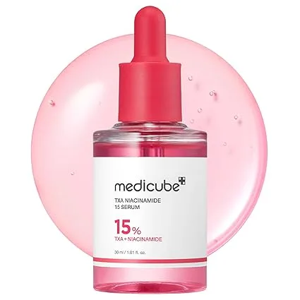 medicube-txa-serum Medicube TXA Serum 30ml in white and red bottle, placed on a white background. Brightening serum with 15% Niacinamide and Tranexamic Acid for dark spots. ShopTESA Ng in Benin City, Nigeria